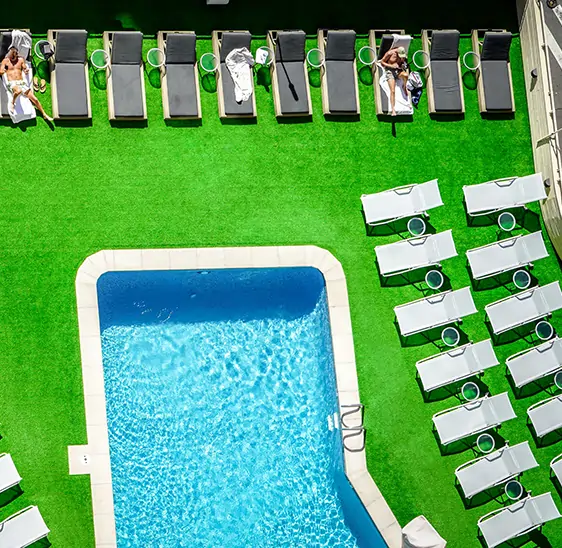 Artificial grass pool lawn drone shot from SYNLawn